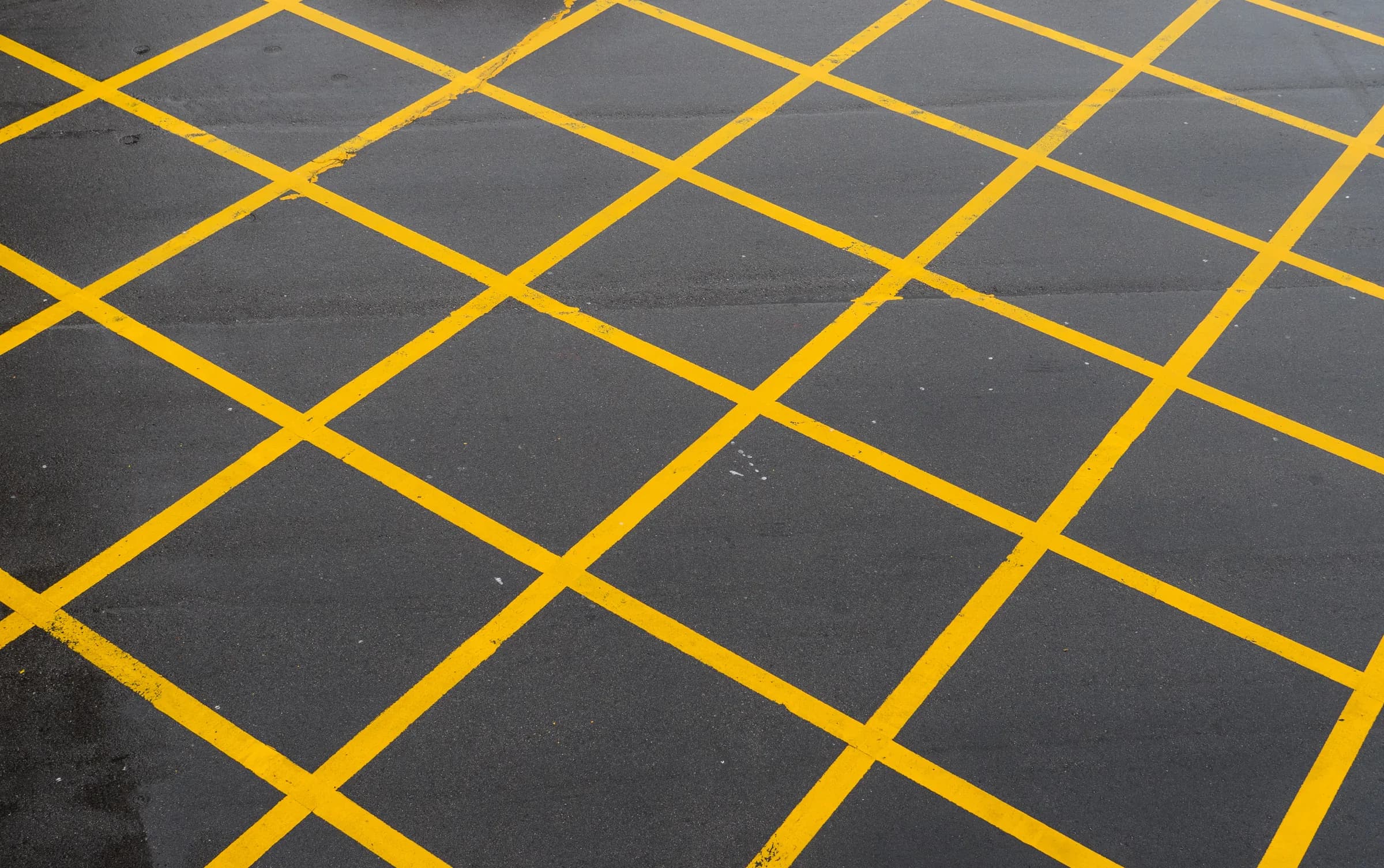 Line marking & safety demarcation resin floor system on an industrial floor